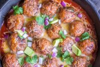 Hearty Sweet Potato and Black Bean Veggie Meatball Enchilada Bake