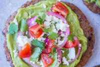 Vibrant Guacamole Tostadas with Black Bean Crisps