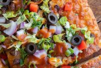 Savor the Crunch: Vegetarian Taco Pizza with Crispy Black Beans