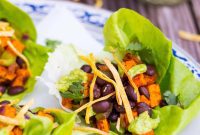 Sweet Potato and Black Bean Lettuce Wraps with Crispy Tortilla Strips and Smashed Avocado with Lime