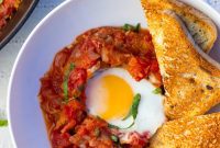 Inferno Eggs Over Squash Strands