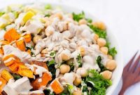 Hearty Kale Salad with Roasted Sweet Potato, Chickpeas, Avocado, and Tahini Miso Dressing