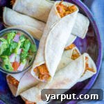 Baked Jackfruit and Pinto Bean Taquitos ready to serve
