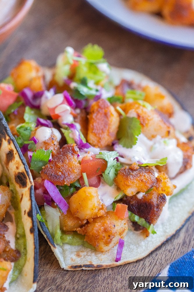 35 Wholesome Plant Based Gluten Free Dinner Recipes 4 Spicy Potato Tacos with a creamy ranch sauce and fresh toppings.
