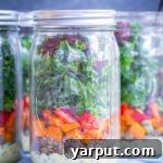 Sweet Potato, Lentil, and Kale Meal Prep Salads with Curry Tahini Dressing - a healthy and easy vegan and gluten-free lunch recipe.