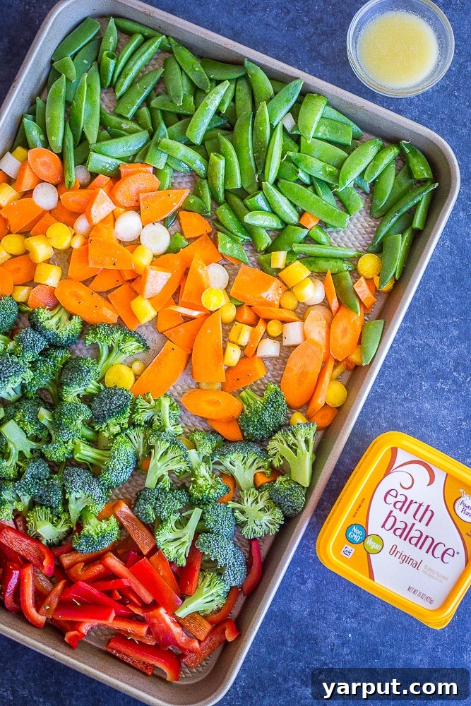 Plant-Powered Spring Pesto Bowls with Garden Veggies 6 A beautifully composed bowl featuring roasted spring vegetables, fluffy quinoa, and Gardein meatless meatballs, topped with a generous dollop of vibrant green pesto.