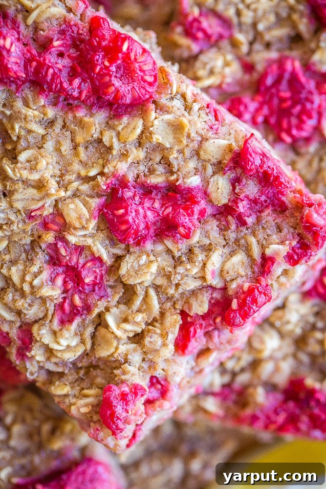 Sun-Kissed Lemon Raspberry Baked Oats 5 A close up of a piece of Lemon Raspberry Baked Oatmeal