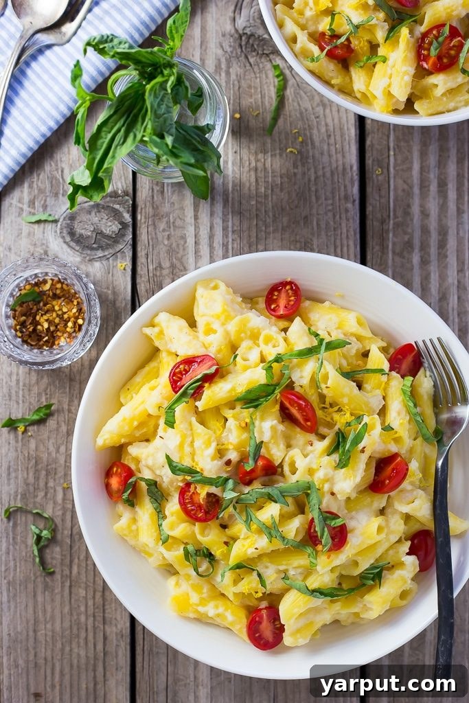 46 Mouthwatering Soy-Free Vegan Dinners 45 Creamy Corn Pasta with Basil and Cherry Tomatoes, a delightful and smooth vegan pasta.