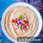 A bowl of Creamy Cauliflower Queso Dip