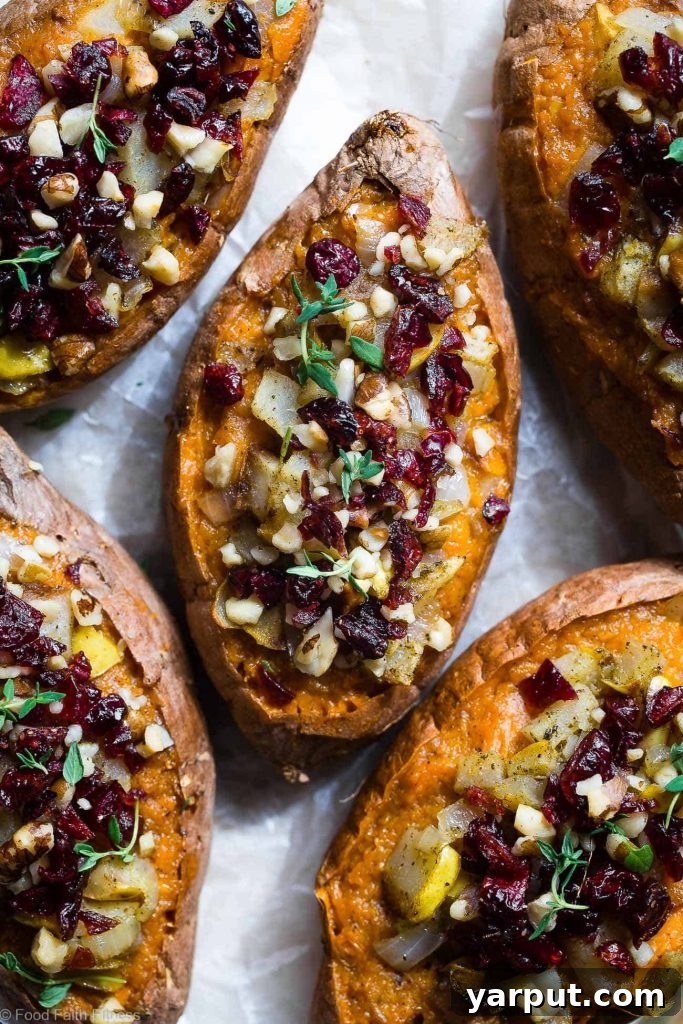 67 Vegan Holiday Recipes: Appetizers, Side Dishes, Salads, Main Courses, and Desserts 25 Harvest Stuffed Sweet Potatoes on a plate