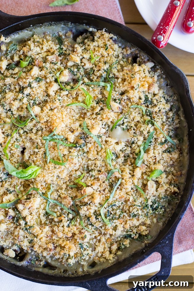 67 Vegan Holiday Recipes: Appetizers, Side Dishes, Salads, Main Courses, and Desserts 28 Vegan Scalloped Potatoes with Crispy Pesto Breadcrumbs in a baking dish