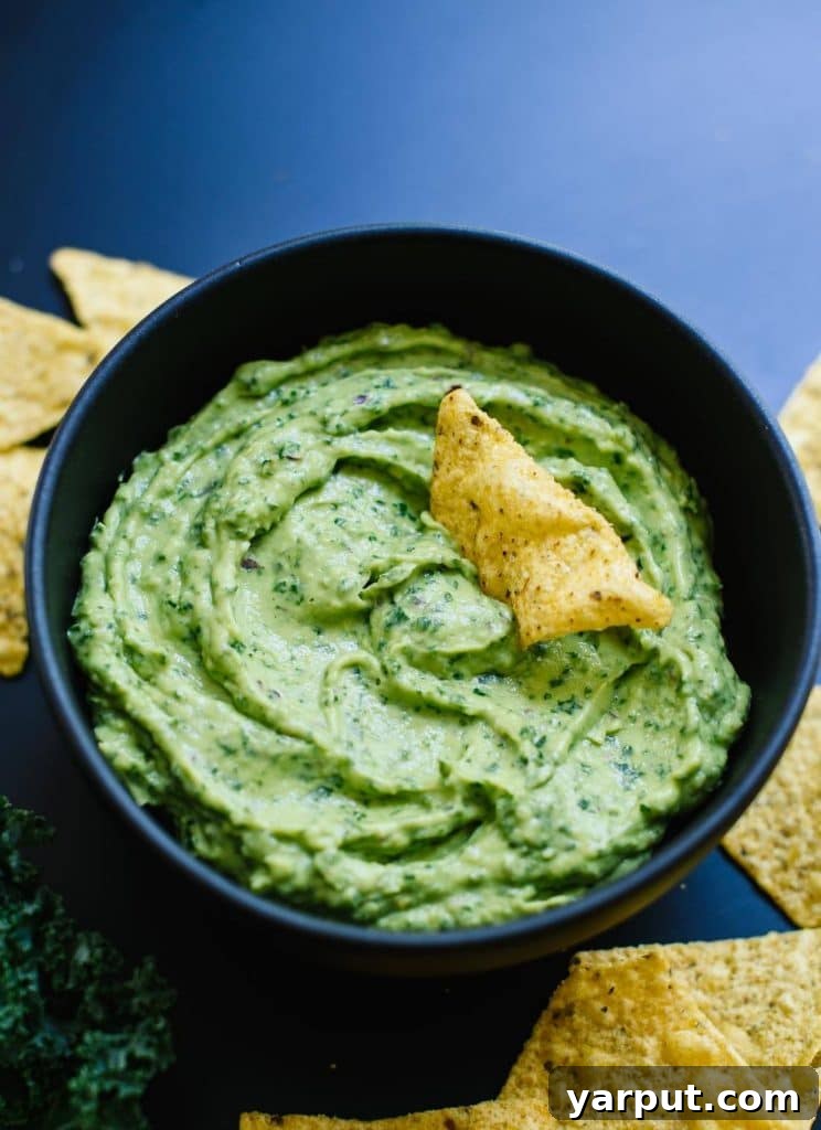 67 Vegan Holiday Recipes: Appetizers, Side Dishes, Salads, Main Courses, and Desserts 4 Kale Guacamole served with tortilla chips
