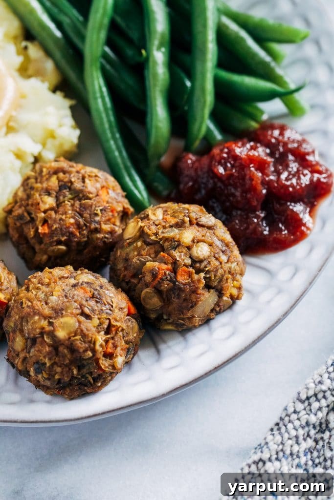 67 Vegan Holiday Recipes: Appetizers, Side Dishes, Salads, Main Courses, and Desserts 50 Vegan Holiday Meatballs with cranberry sauce