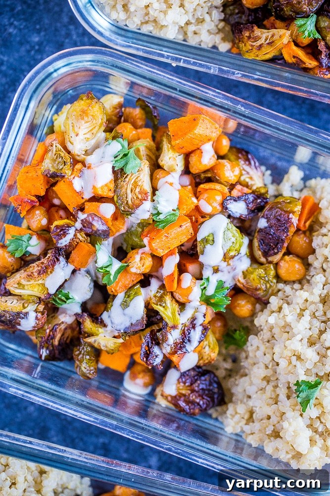 Golden Roasted Sweet Potato Chickpea Bowls 5 Roasted Sweet Potato and Chickpea Meal Prep Bowls close up with dressing