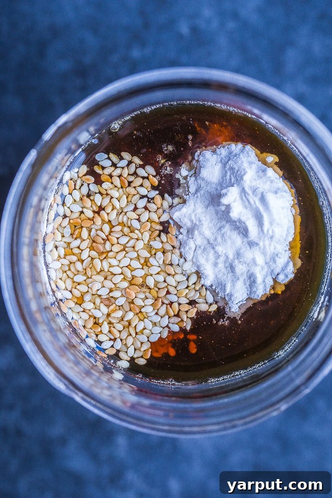 The Perfect Wholesome Stir Fry Sauce 4 Close up of the healthy ingredients for the best stir fry sauce, highlighting the texture of grated ginger and garlic.