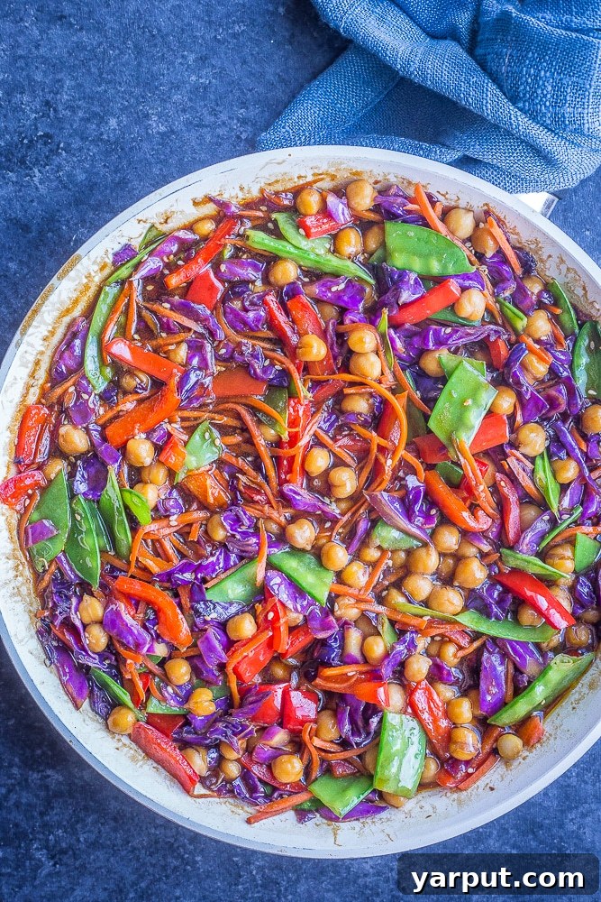 The Perfect Wholesome Stir Fry Sauce 6 A pan of perfectly cooked stir fry, glistening with the best homemade stir fry sauce, ready to be served.