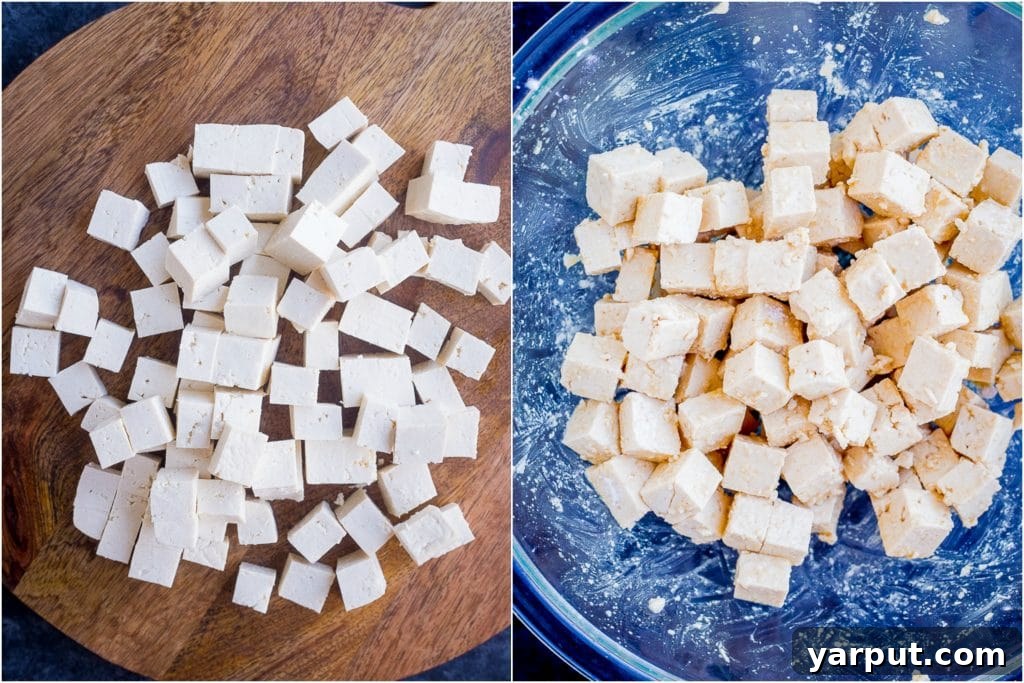 Crispy Baked Tofu Perfection 3 Crispy Baked Tofu ingredients on a cutting board and in a bowl, showcasing fresh ingredients