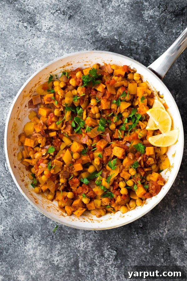 26 Vegan One-Pot Wonders for Easy Weeknights 17 Vegan Moroccan Chickpea Skillet, colorful and spiced, served in a cast iron pan