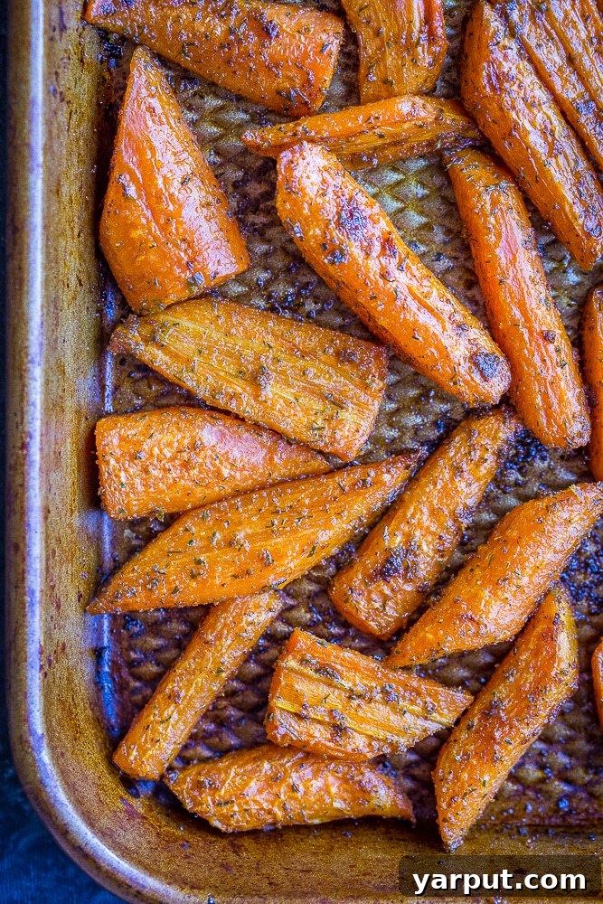 Delicious Ranch-Roasted Carrots 2 Ranch Roasted Carrot Recipe on a sheet pan, ready to serve