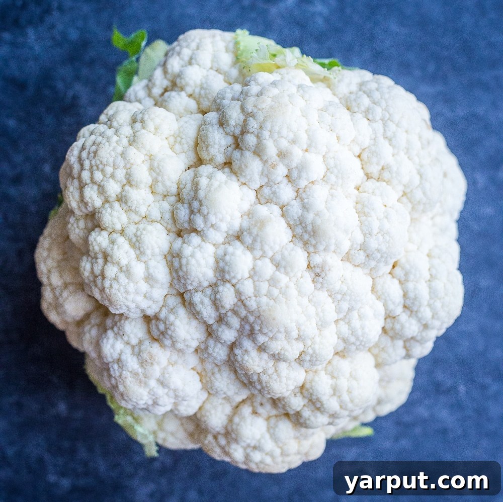 Crafting Delicious Cauliflower Rice 3 Fresh head of cauliflower, ideal for preparing homemade cauliflower rice