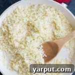 A simple yet enticing image of cauliflower rice, highlighting its texture and freshness.