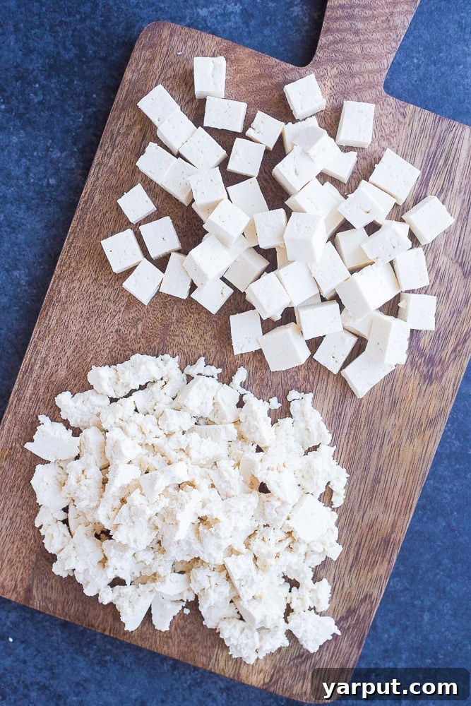 Homemade Vegan Feta Perfection 3 Cubed and crumbled tofu pieces, prepared to be marinated for vegan feta cheese