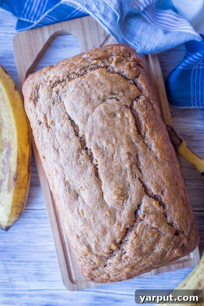Naturally Sweet Effortless Banana Bread 3 Whole loaf of healthy banana bread, perfectly golden brown and ready to slice