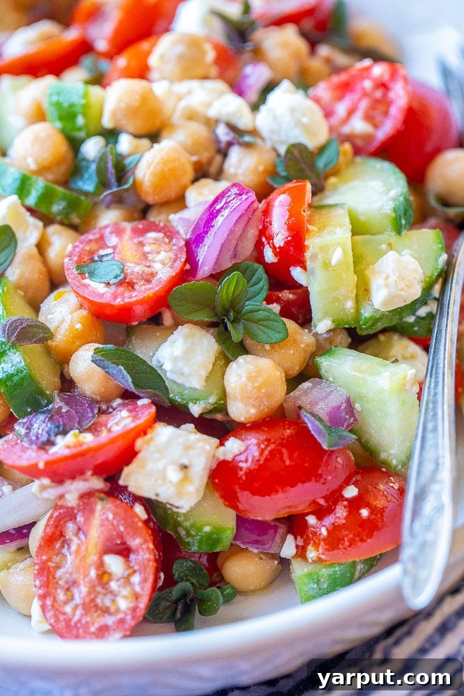 Effortless Chickpea Mix 4 Close up view of chickpea salad with lots of vegetables