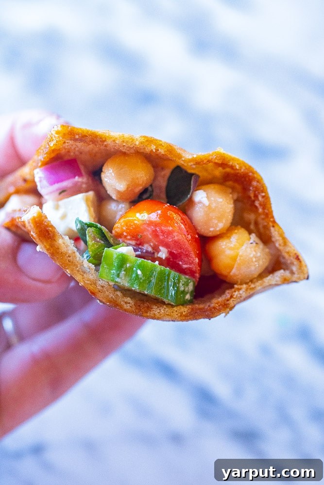 Effortless Chickpea Mix 5 Easy Chickpea Salad stuffed into a pita