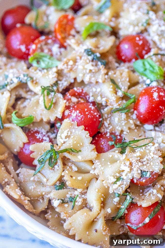 Vibrant Bruschetta Pasta Salad with Parmesan 6 Another close-up of the delicious Bruschetta Pasta Salad, ready for a fork