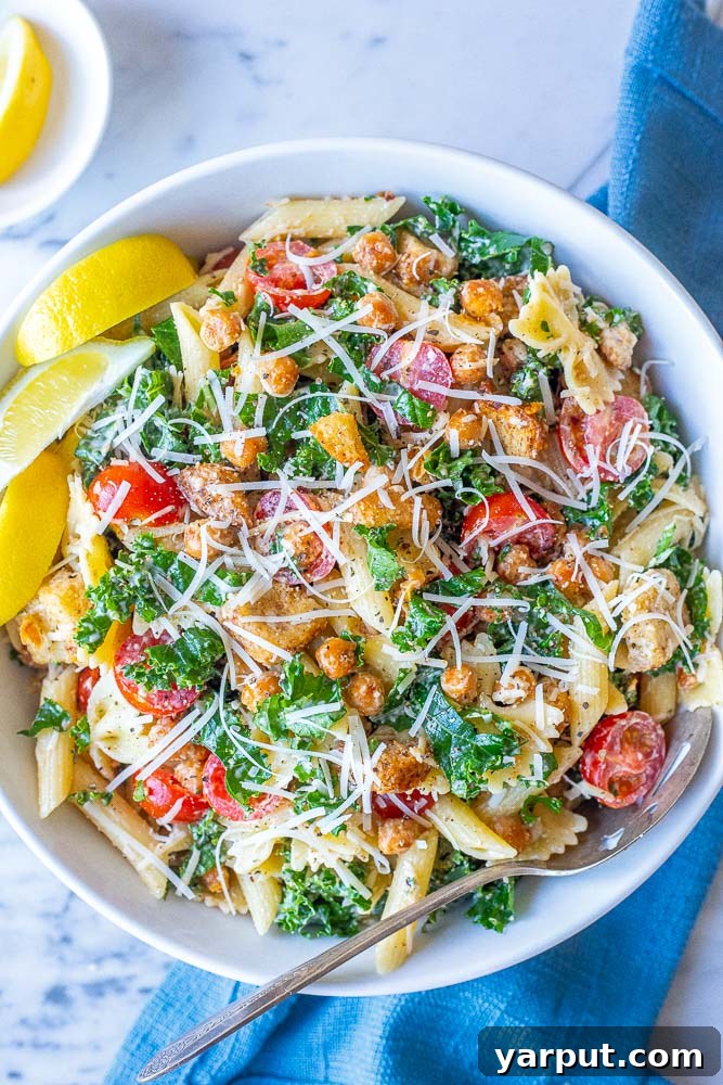 Elevated Kale Caesar Pasta 2 A beautifully presented bowl of creamy Kale Caesar Pasta Salad, garnished and ready to be served