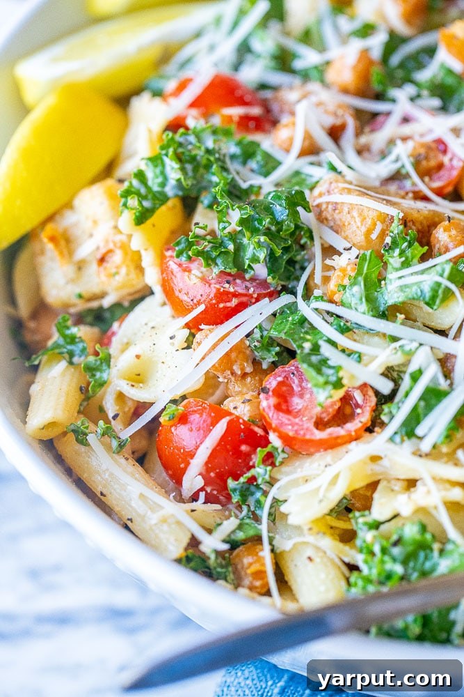 Elevated Kale Caesar Pasta 5 Close-up photograph of the Kale Caesar Pasta Salad, highlighting its texture and inviting presentation