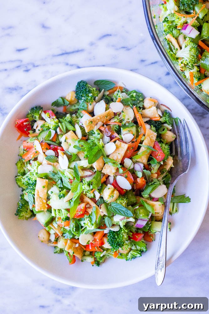 Sesame Ginger Broccoli Crunch 5 Styled photo of a fresh Asian Broccoli Salad ready to be served