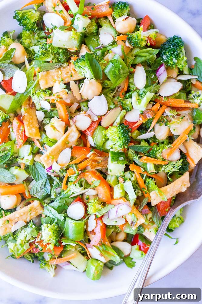Sesame Ginger Broccoli Crunch 6 Close up shot of Asian Broccoli Salad in a bowl, showing texture and freshness
