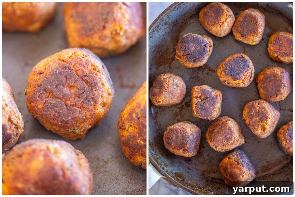 Crispy vegetarian meatballs being cooked in a pan with olive oil.