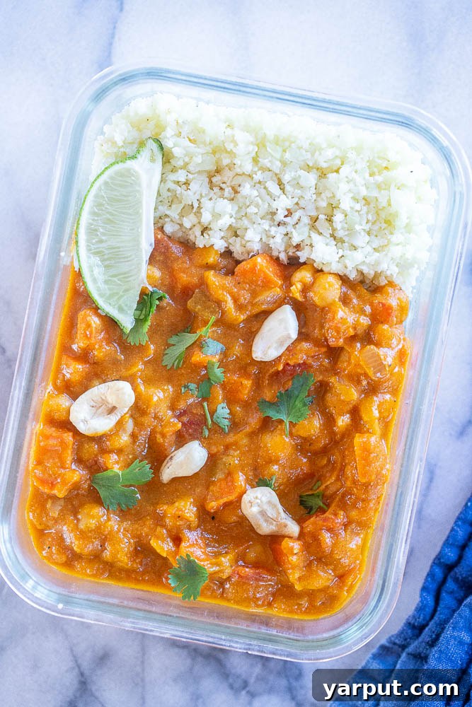 Creamy One-Pot Vegan Pumpkin Curry 5 Portioned vegan pumpkin curry in meal prep containers