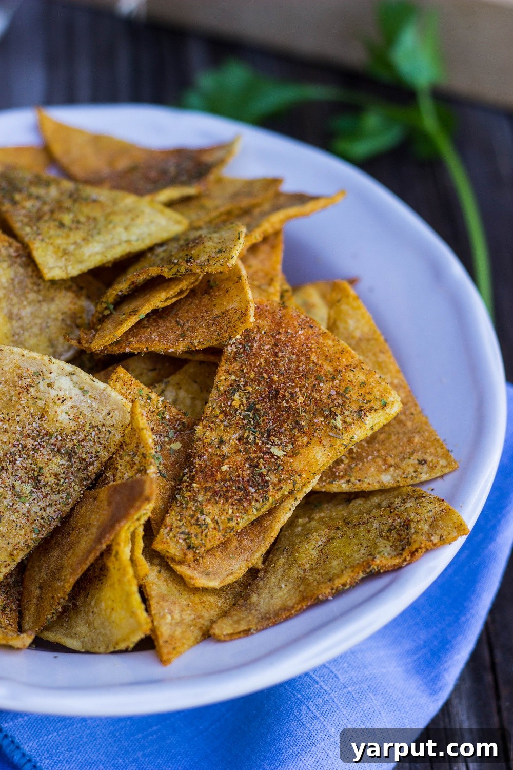 A beautifully arranged bowl brimming with freshly made Homemade Cool Ranch Doritos, inviting and perfectly seasoned, ready for snacking.