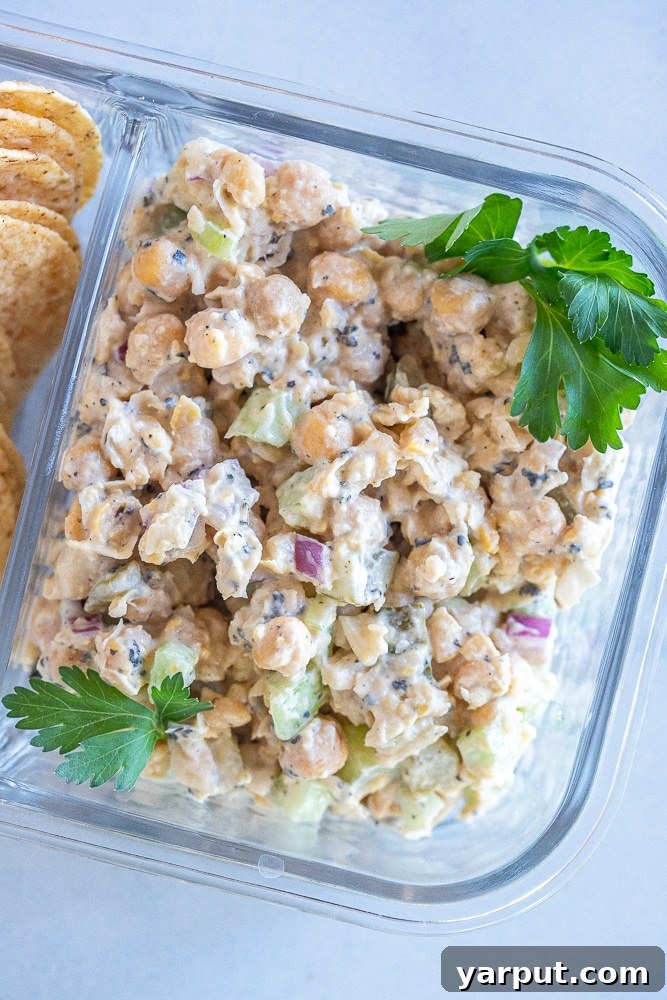 The Ultimate Plant-Based Tuna Salad 7 Individual serving of vegan tuna salad in a meal prep container, ready for a healthy and convenient lunch.