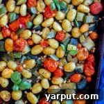 Sheet Pan Gnocchi with Zucchini and Cherry Tomatoes cooked with fresh herbs
