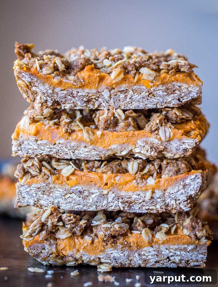 Stack of healthy and delicious sweet potato pie bars, perfect for any time of day.