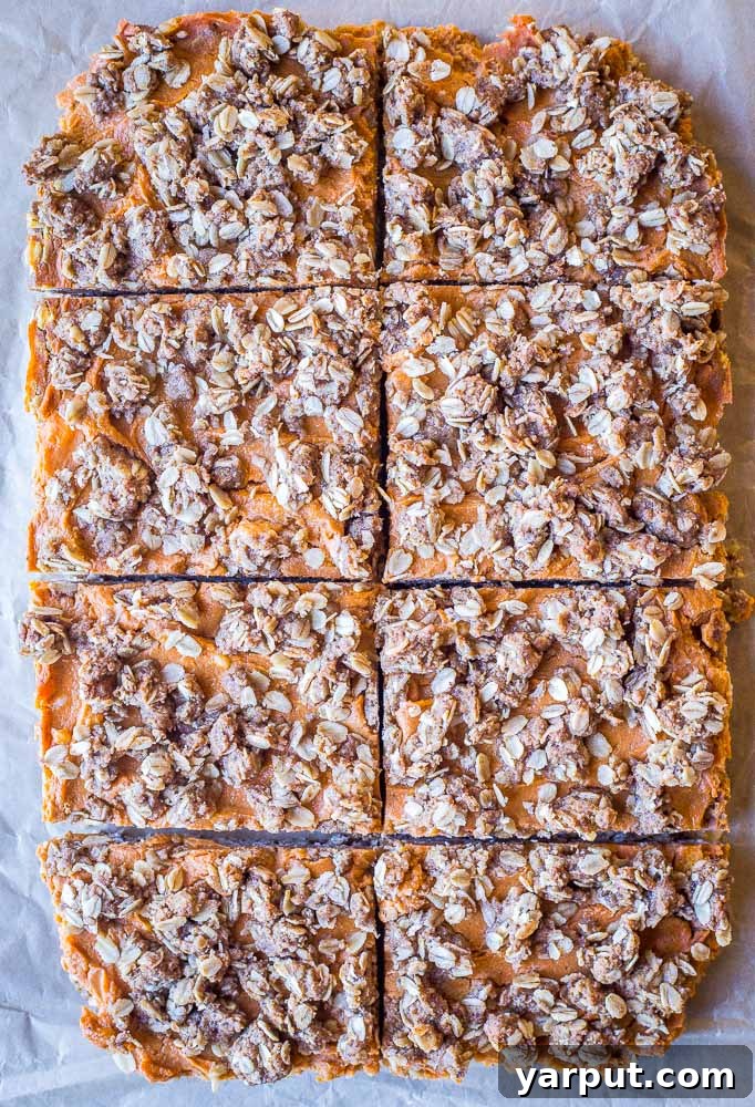 Freshly baked and sliced sweet potato pie bars, ready to be enjoyed.
