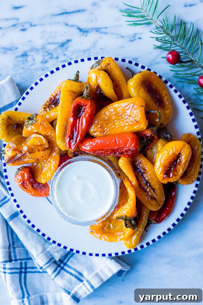 a plate of roasted sweet peppers with creamy goat cheese dip