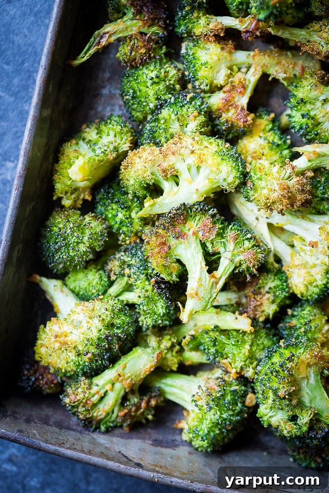a tray of cheesy garlic roasted broccoli