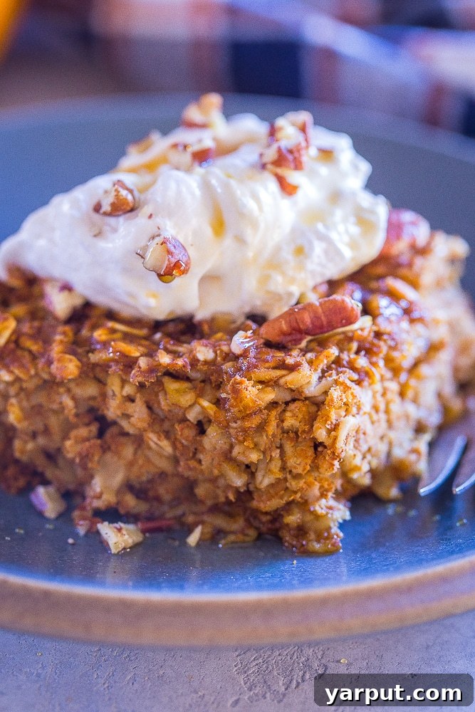 a slice of pumpkin pie baked oatmeal on a plate