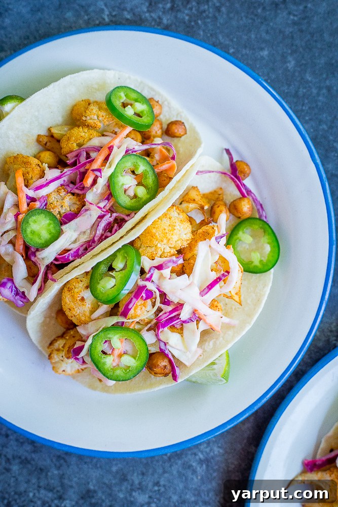 BBQ Cauliflower and Chickpea Tacos, a smoky and flavorful vegetarian taco option with a fresh slaw.