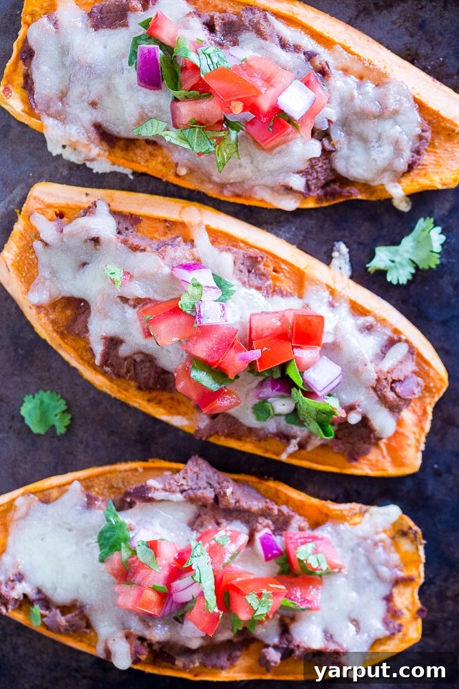 Sweet Potato Tostadas, a vibrant and healthy vegetarian tostada recipe, garnished with fresh herbs and lime.