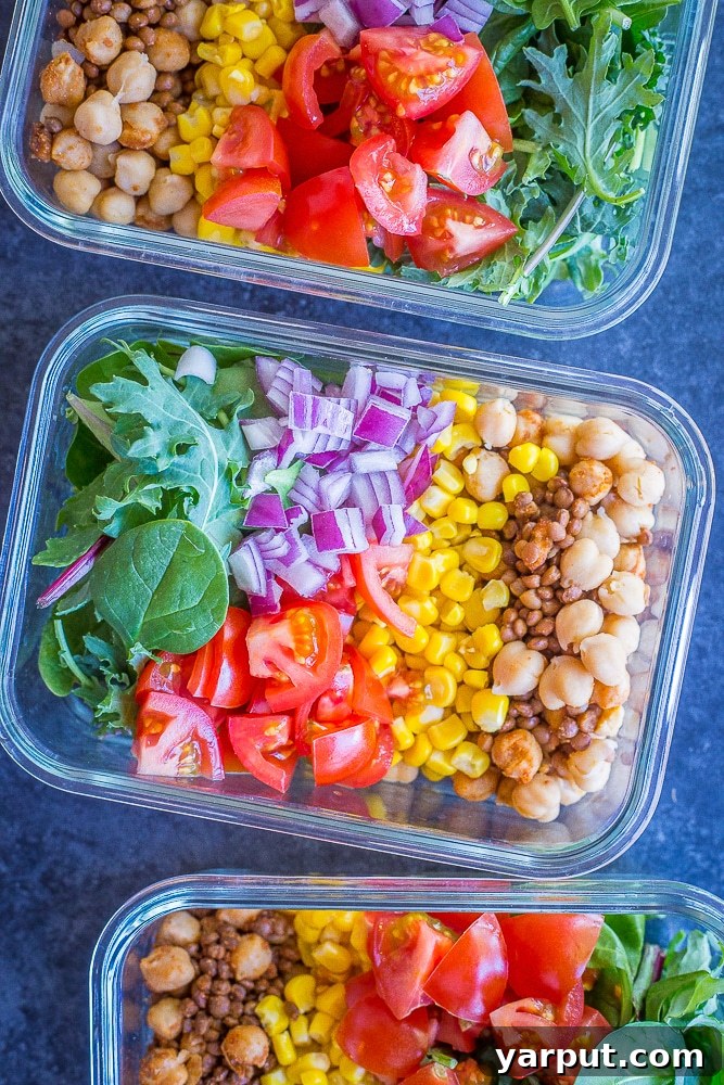 Chickpea and Lentil Taco Salad Bowls, high-protein and perfect for meal prep, served in glass containers.