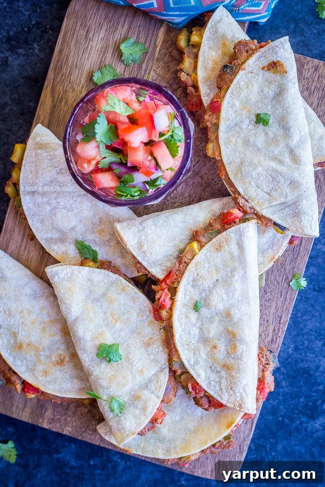 Crispy Baked Tacos with Summer Vegetables, a fresh and crunchy seasonal taco recipe, artfully arranged.