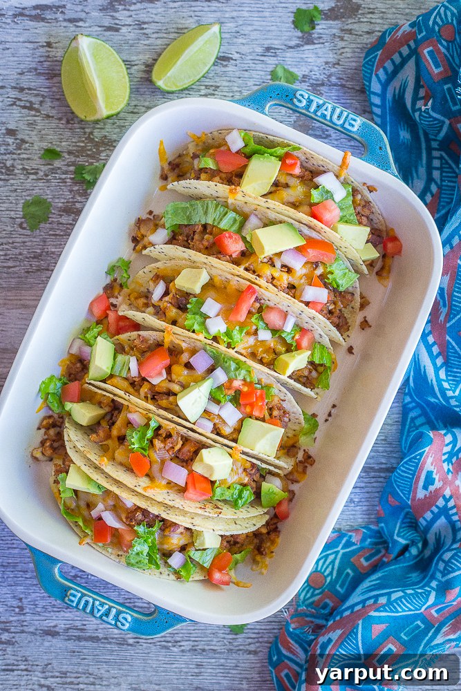 Crispy Baked Tacos with Seasoned Cauliflower, a flavorful and satisfying vegetarian taco, topped with fresh salsa.