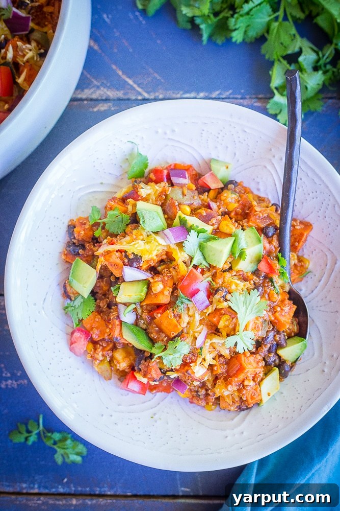 Sweet Potato Quinoa and Veggie Enchilada Bake, a healthy and hearty casserole, fresh from the oven.